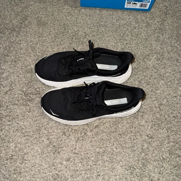 Hoka Women's Black Athletic Shoes with White Soles - Picture 2 of 4